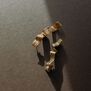 Long ribbon drop stud earrings by Emma Calvert